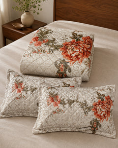 Folded Ivory Rust Bloom Printed Silk bedspread with two pillow covers