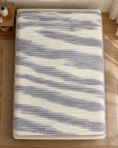 Overhead view of cloud grey stripe Smartchoice AC comforter