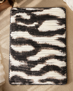 Overhead view of charcoal ivory brushstripe Smartchoice AC comforter