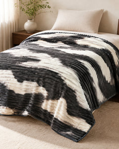 Side-angle view of charcoal ivory brushstripe Smartchoice AC comforter