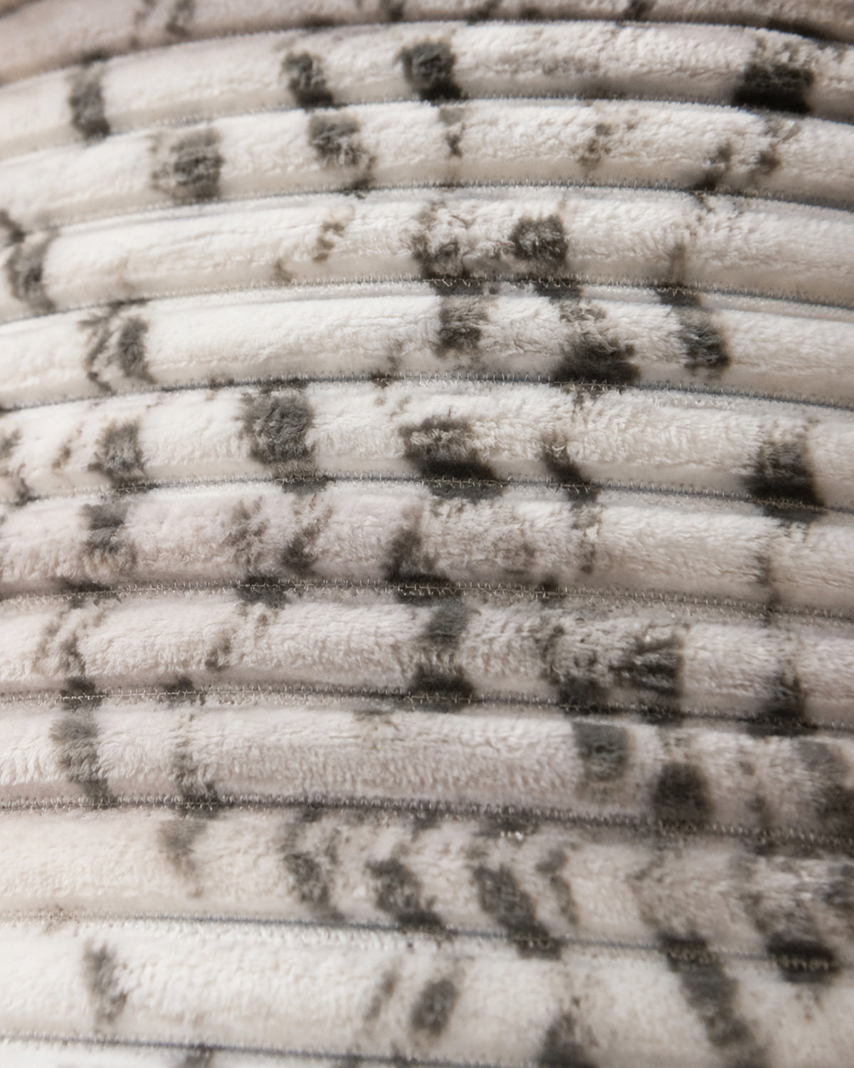 Close-up of ivory mist grey ribbed Smartchoice comforter fabric