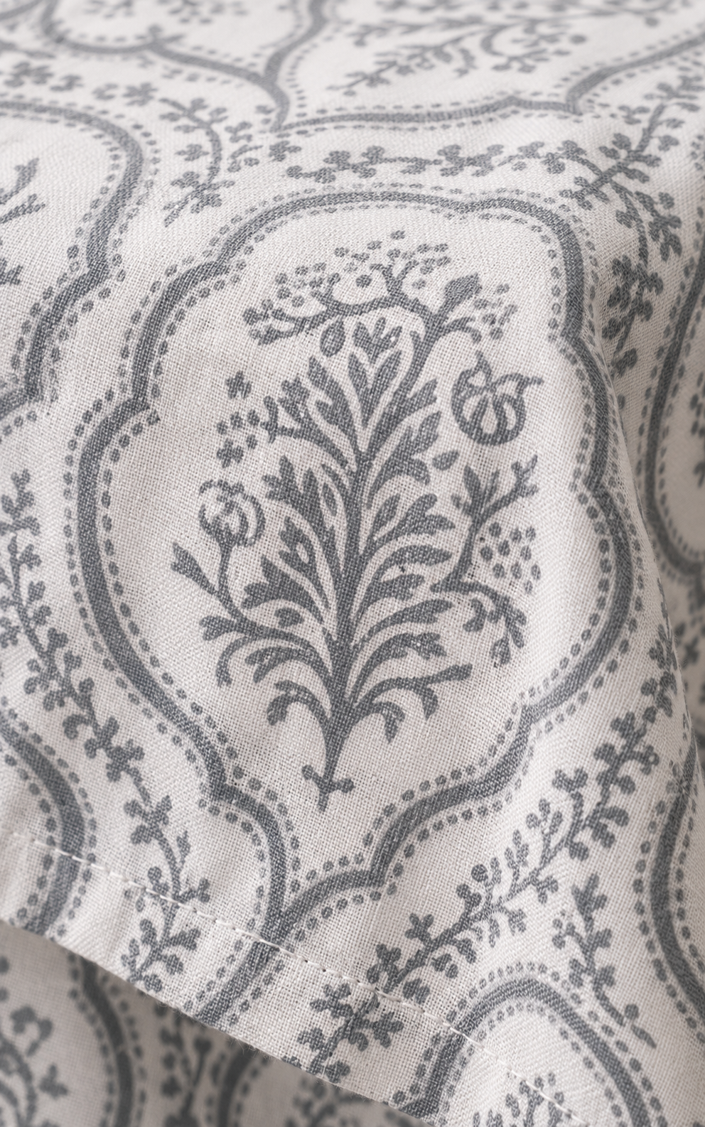 Close-up of Grey Medallion cotton fabric weave and print