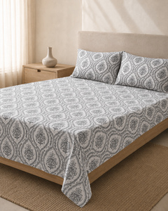 Side-angle lifestyle view of Grey Medallion cotton bedsheet set
