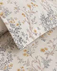 Ivory Meadow cotton weave, botanical print, stitching and pillow flange detail