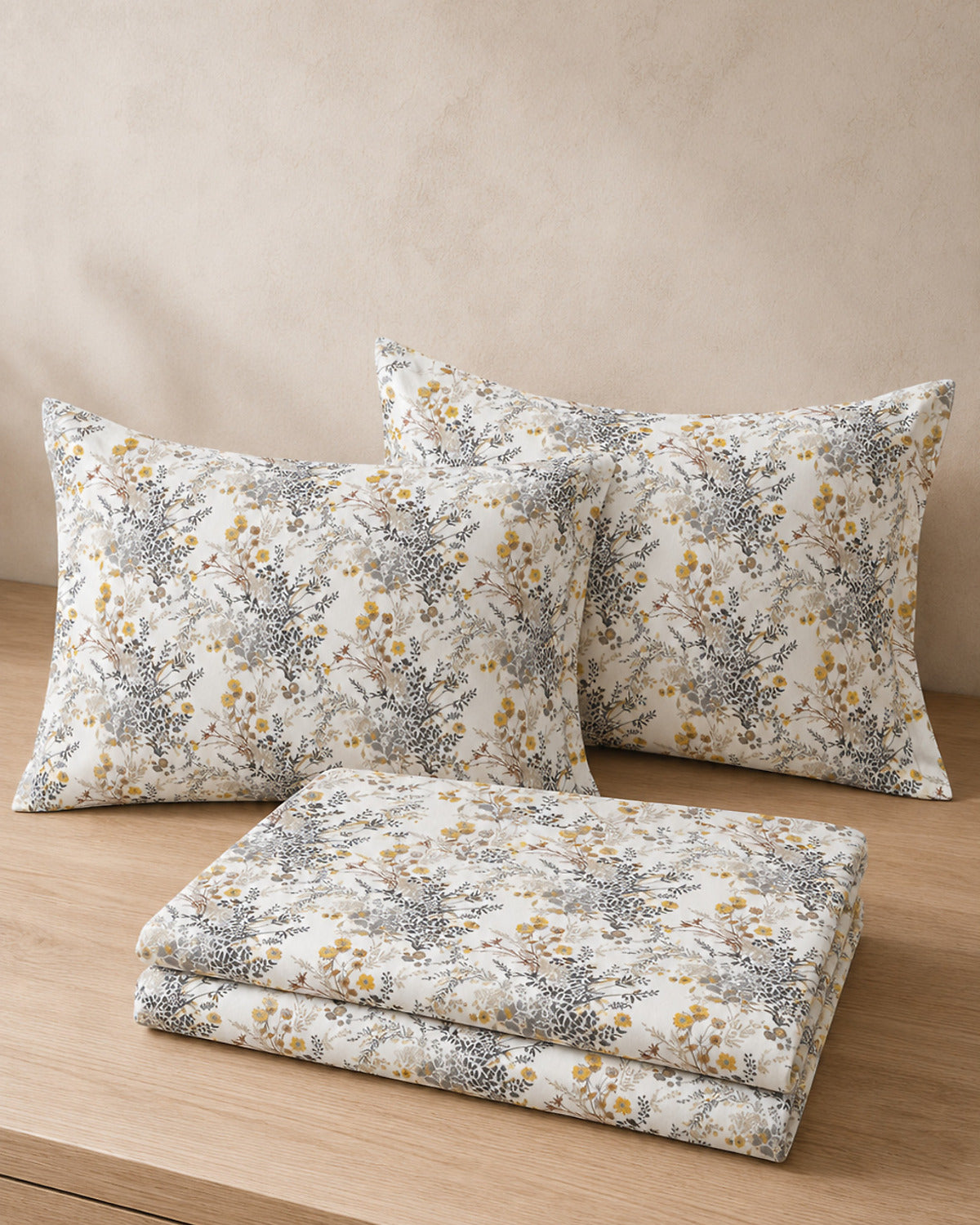 Ivory Meadow cotton bedsheet with two matching pillow covers, folded set