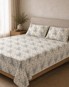 Ivory Meadow Cotton Bedsheet Set styled in a neutral bedroom
